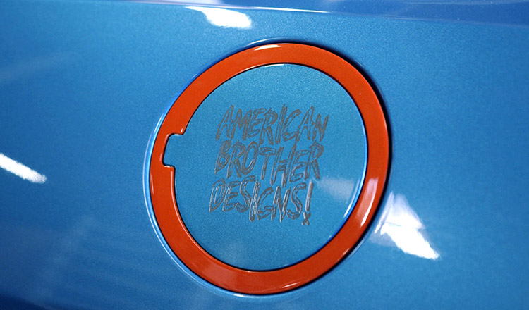 Laser engraved American Brother Designs fuel door.