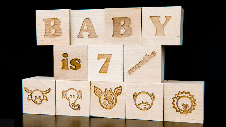 group of laser engraved wooden baby blocks