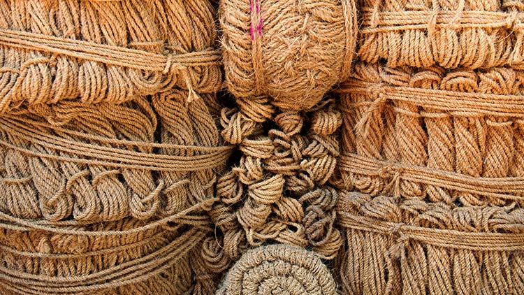 coir rope bundles stacked organized