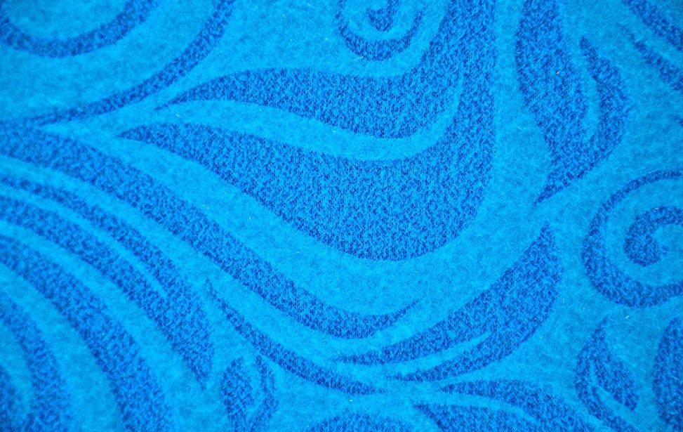 Close-up of a blue laser engraved fleece pattern